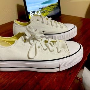 Brand New White Converse size 8 1/2 women’s size.